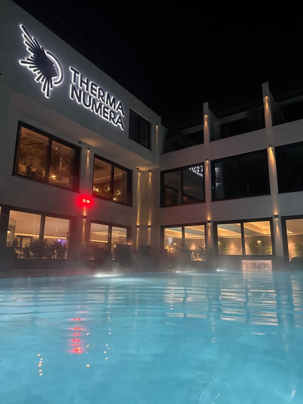 Therma Numera hotel photographed at night in Burgas