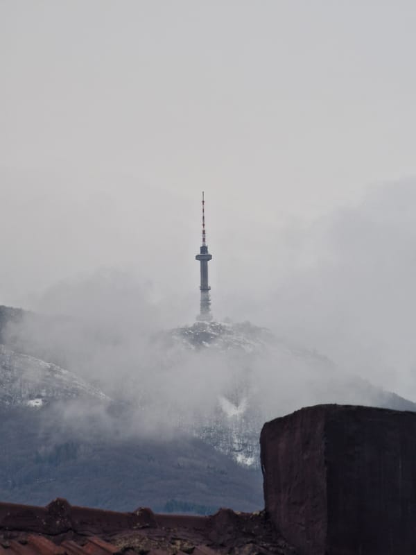 Heavy fog blankets Sofia's mountains and TV tower