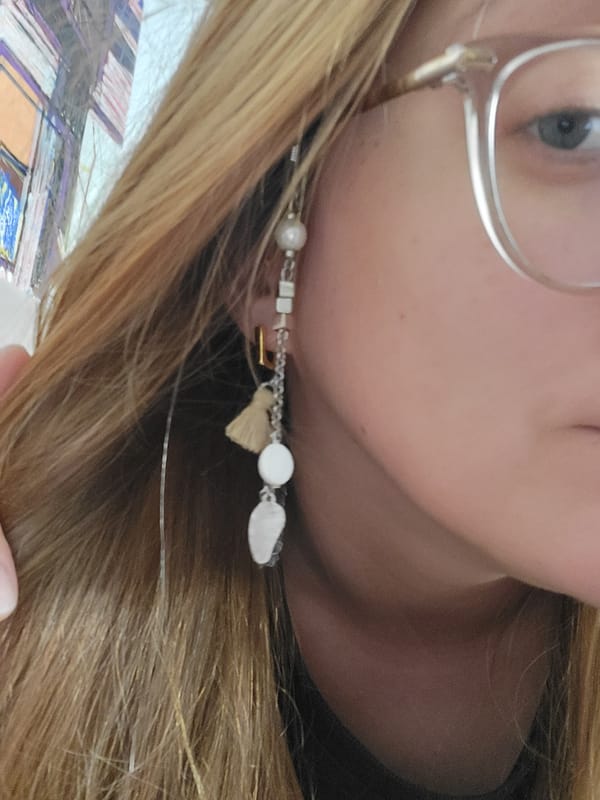 Woman relaxes with dog on couch in Budva