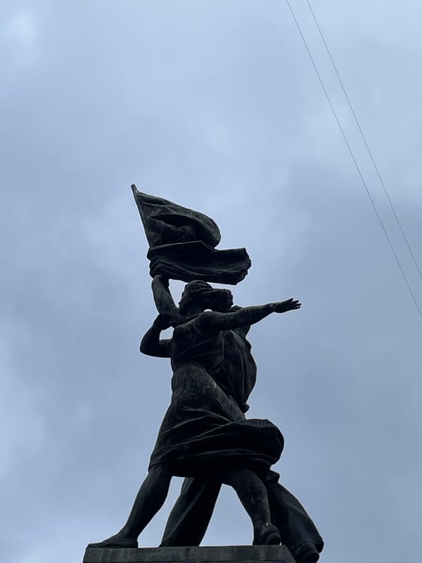 Poodle playtime and statue viewing documented in Yekaterinburg