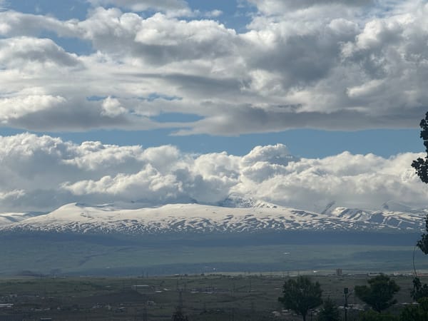 Cloudy skies, snow-capped peaks observed over Yerevan valley