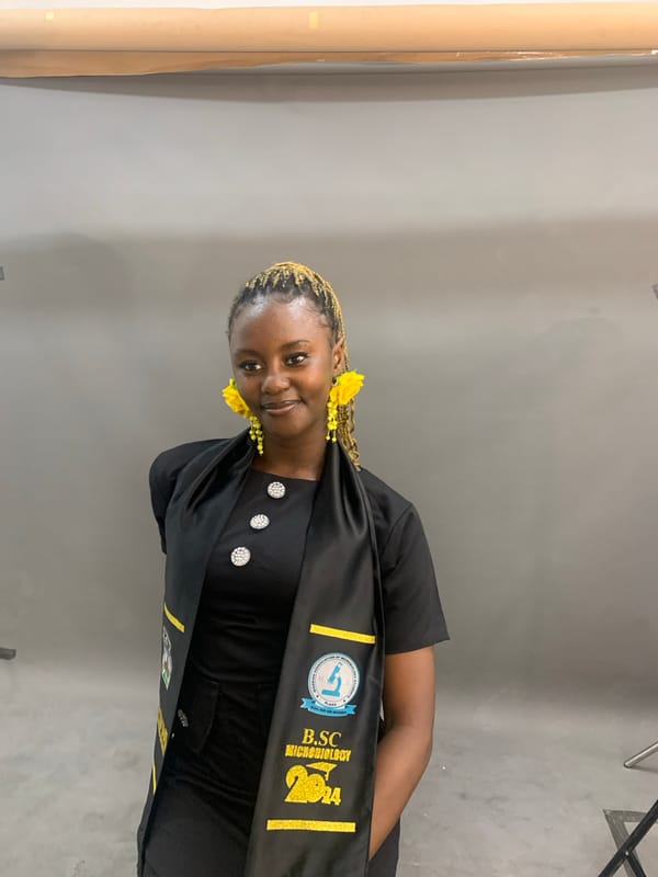 Graduation photography session documents microbiology degree celebration in Nigeria