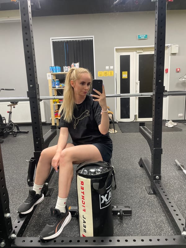 Woman takes gym selfie on punching bag in Vladivostok