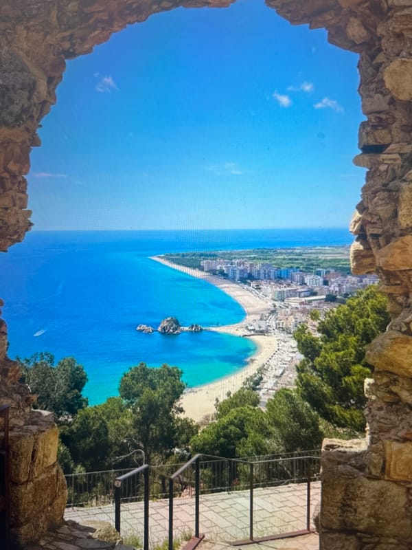 Mediterranean coastal town captured in sunny morning views