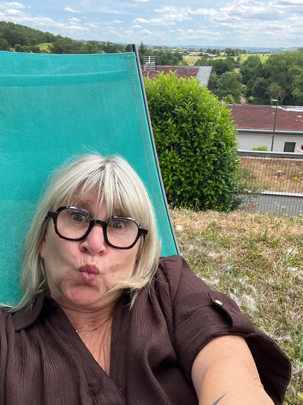 Woman enjoys afternoon reading session in French garden
