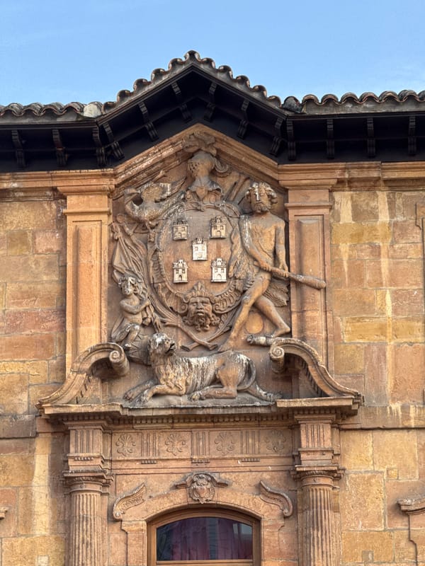 Sunrise captured over Oviedo cityscape from elevated viewpoint