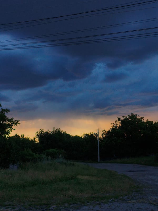 Stormy evening bike ride through rural Ustyvytsia, Ukraine