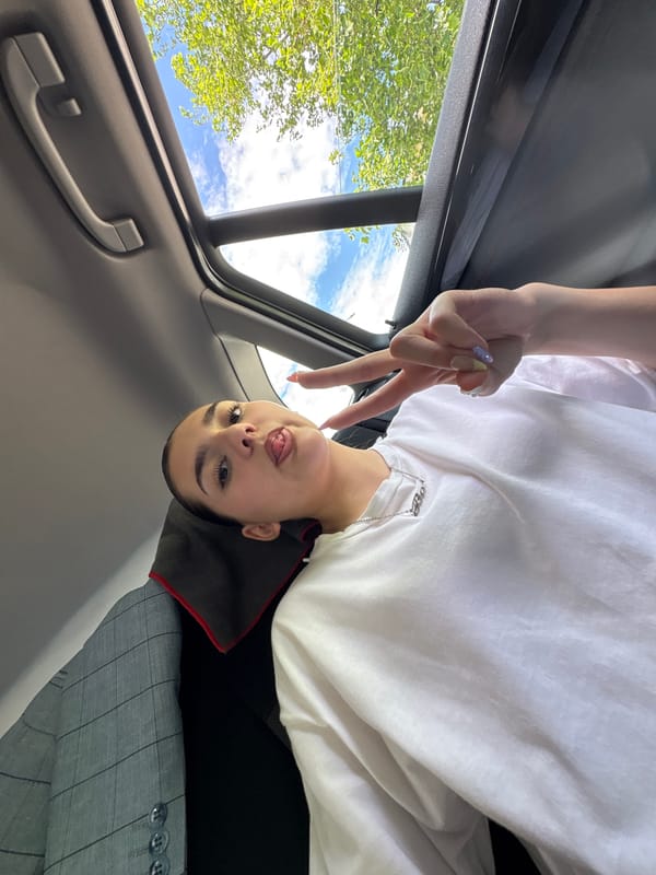 Young women document casual car trips and street moments