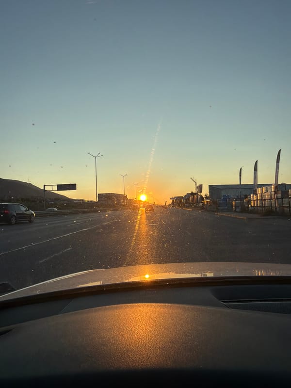 Golden hour sunset through a windshield in Sofia
