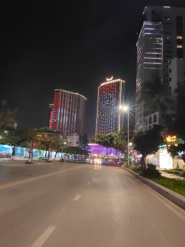 Wet night street scene captured in Bai Chay Ward