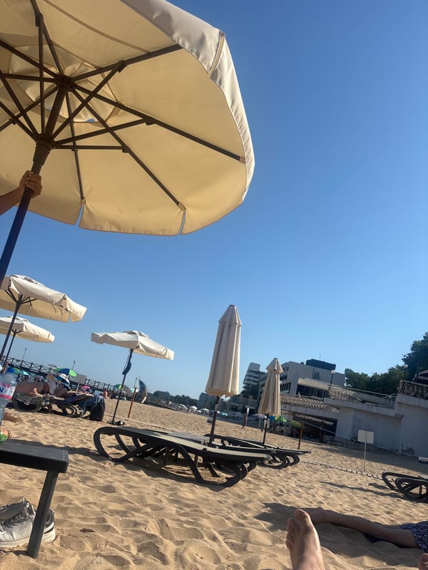 Lazy afternoon under beach umbrellas on Varna's sunny shore