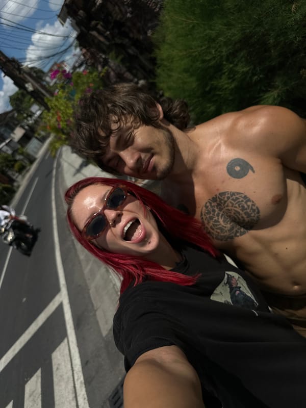 Woman and cat observed in North Kuta morning scene