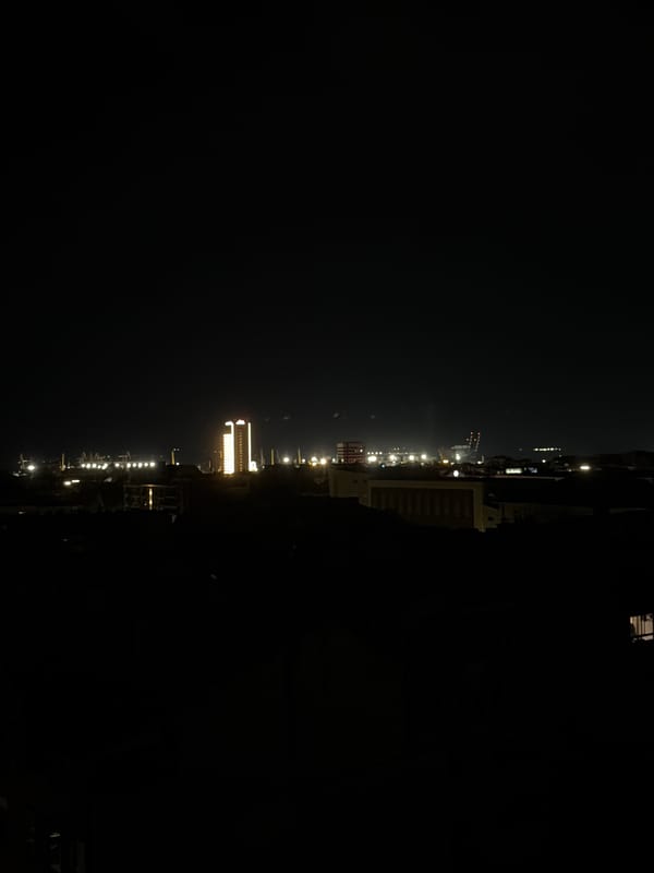 Night lights illuminate Burgas cityscape including Hotel Bulgaria