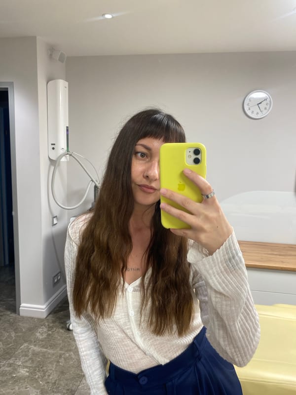 Indoor selfie session in Votkinsk, white top and dark blue outfit