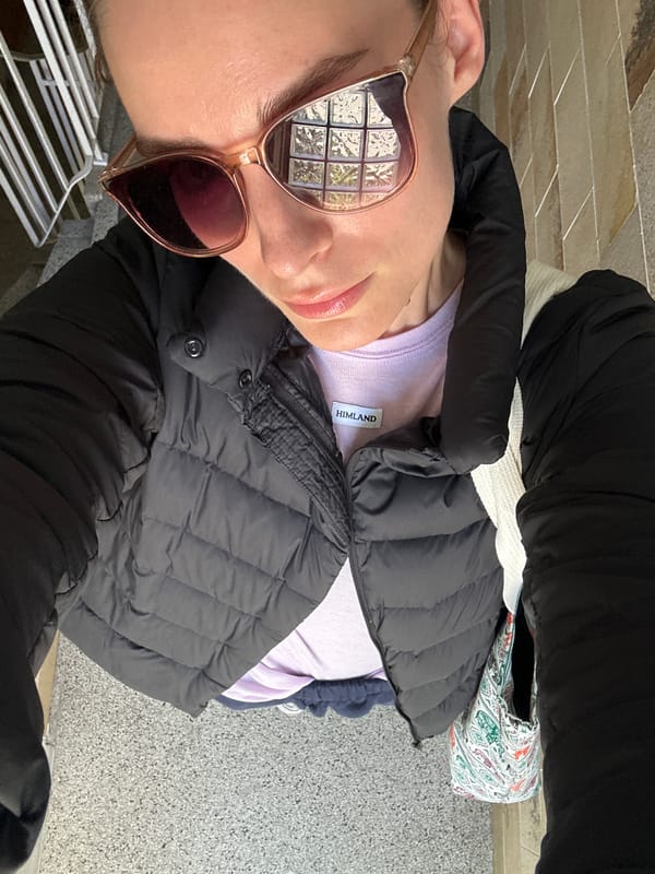 Woman takes selfies indoors in Kiel, Germany