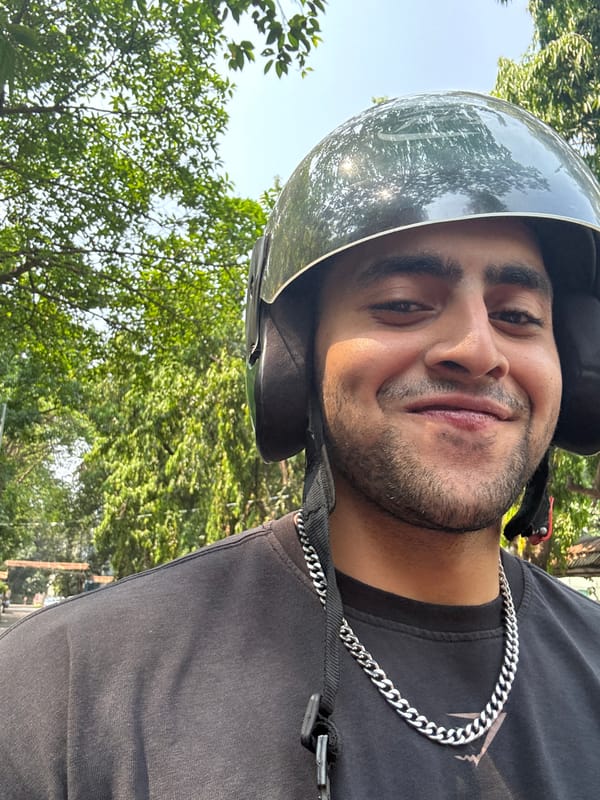 Helmeted man photographed on Kolkata street near transit bus