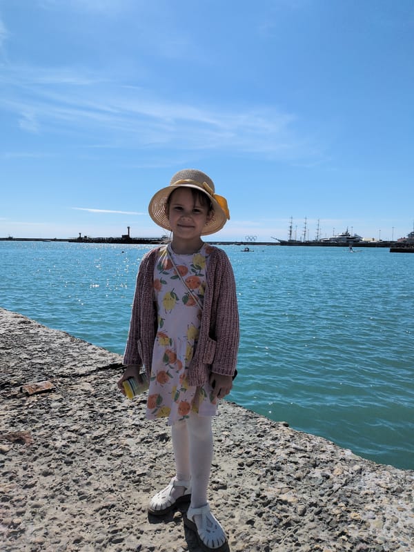 Young girl explores Sochi seaside attractions during afternoon outing