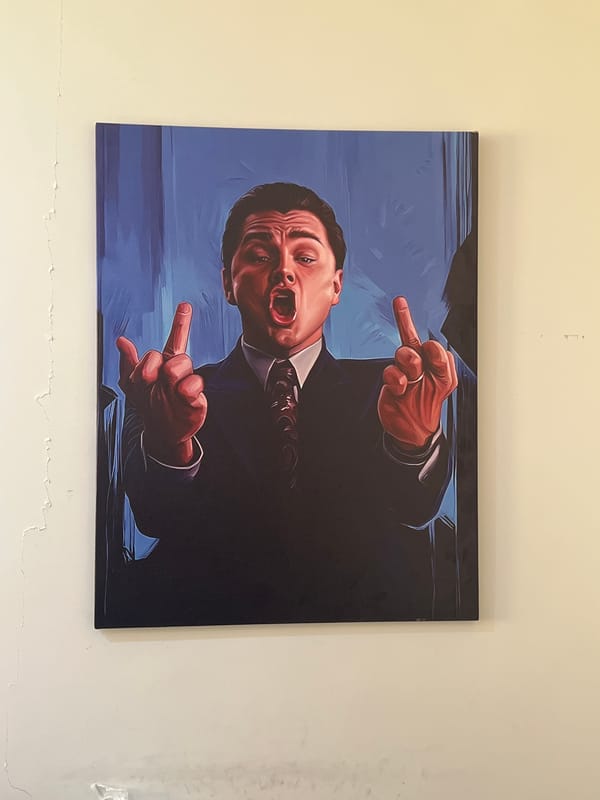 Provocative painting of suited man making gesture spotted in Astana