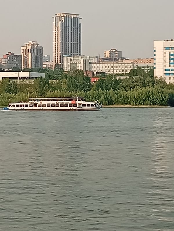 River, rooftops, and everyday interiors across a Novosibirsk morning