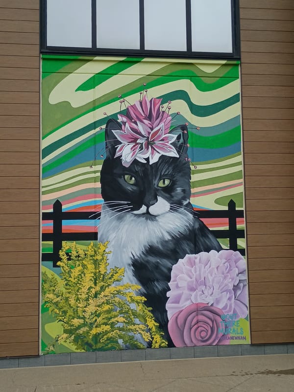 Lexington building murals showcase animals in decorative headwear