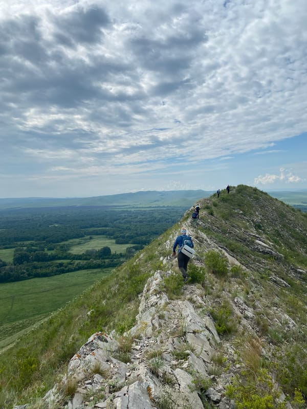 Morning hike and hillside picnic in Russian countryside