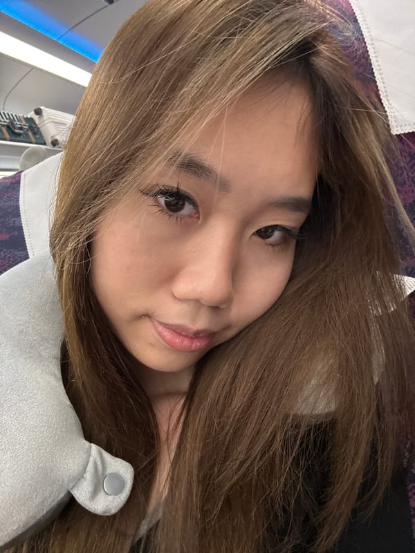 Woman photographed resting against pillow in Huashi, China