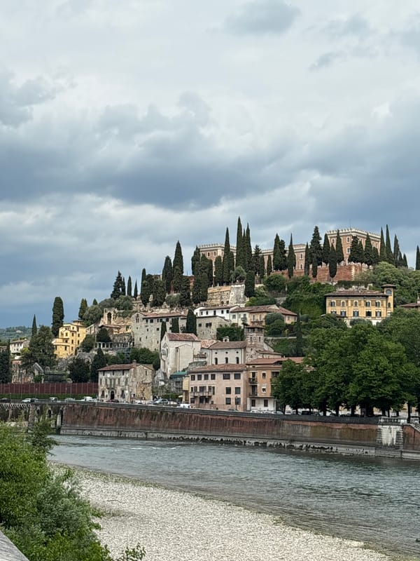 Tourist captures overcast Verona scenes along Adige River