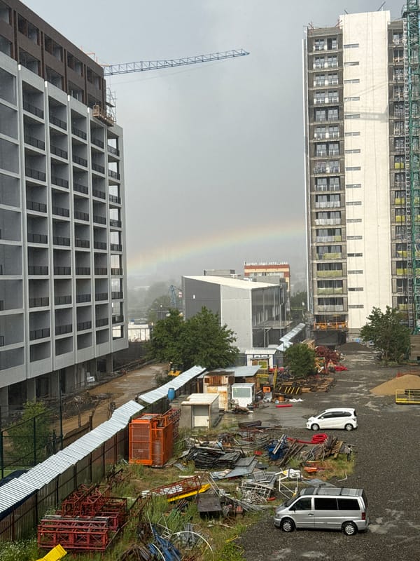 Rainbow over a rainy Tbilisi construction site
