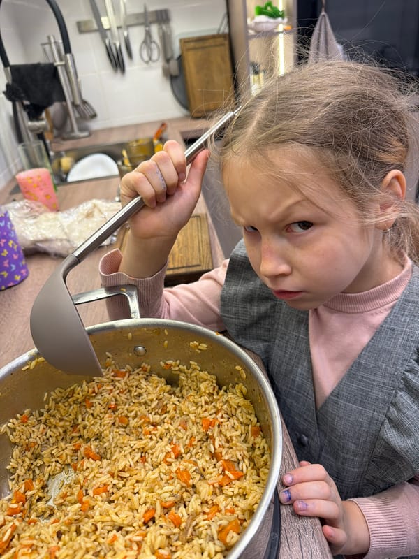 Russian household scenes feature girl cooking, pet rat play