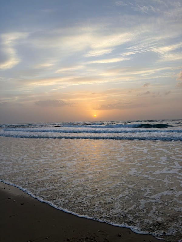 Tel Aviv beachgoers enjoy typical sunset activities along Mediterranean shore