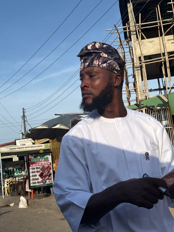 Street scene documented in Ado, Nigeria amid commercial activity