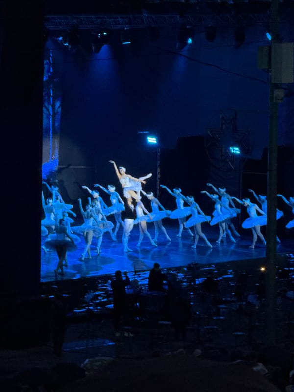 Outdoor ballet and orchestra performance at dusk in Izhevsk