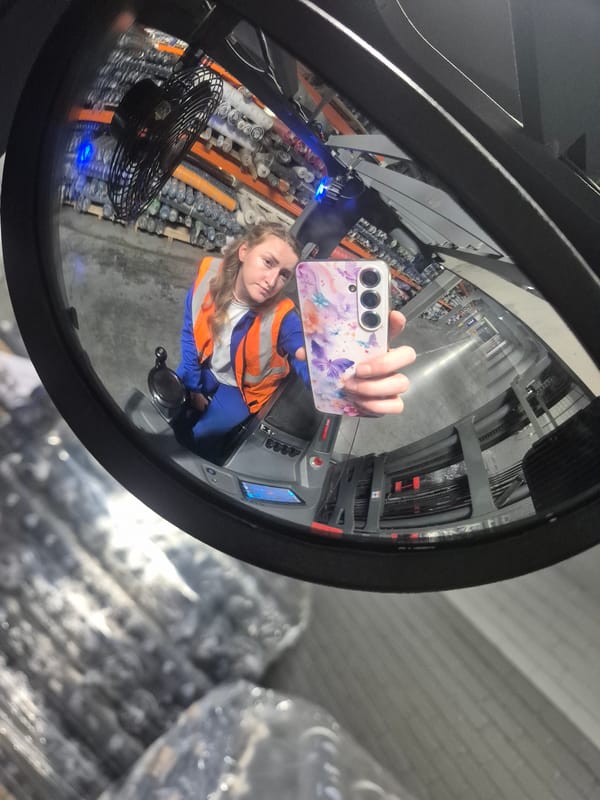 Forklift mirror selfie from a warehouse in Chaikovsky, Russia
