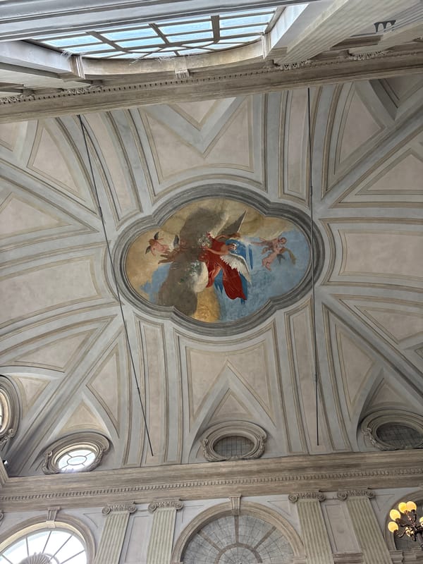 Tourists photograph historic Milan church interior and architecture