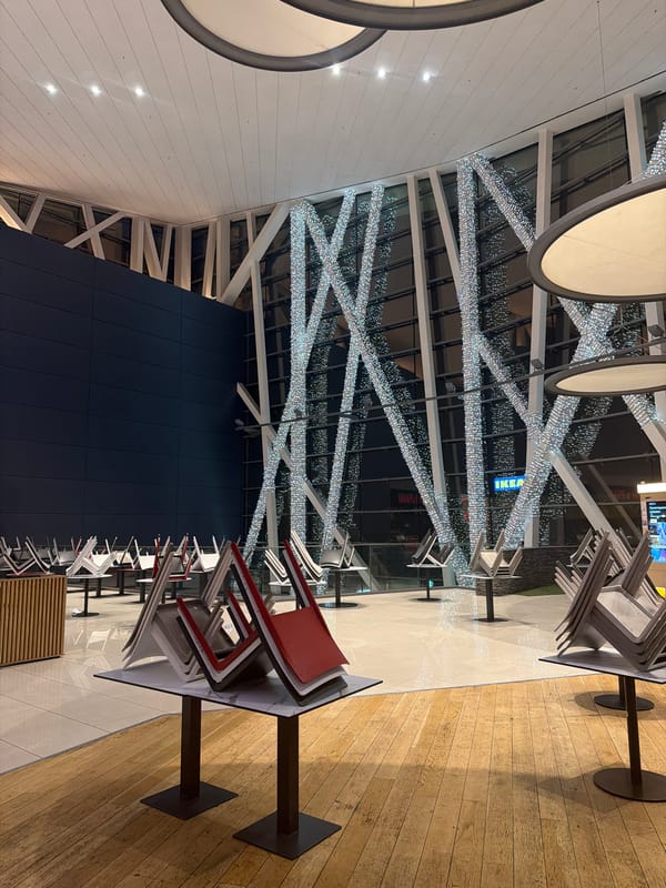 Person moves through Sofia mall taking selfies in evening