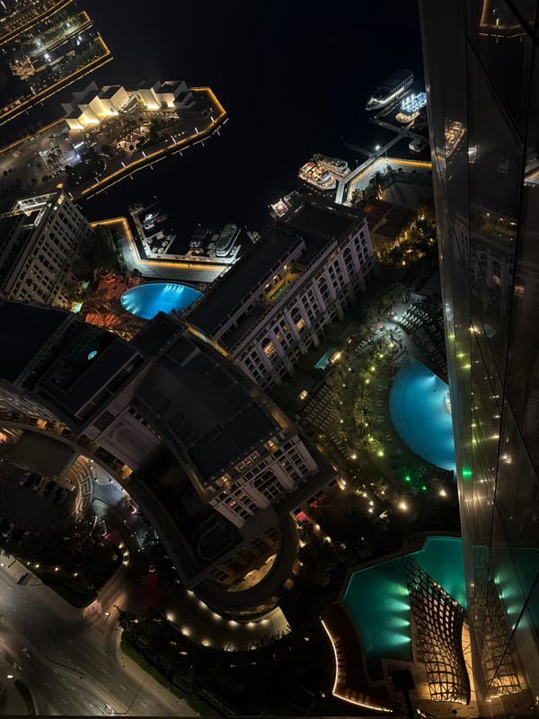 Dubai at night, from above and street level