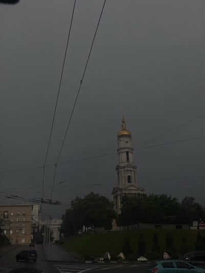 Overcast afternoon captured across multiple Kharkiv street scenes