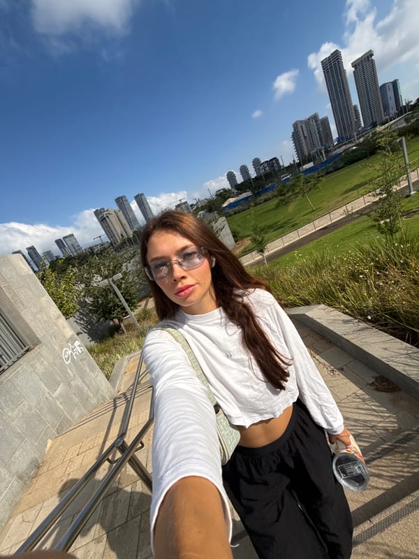 Sunny selfie in a Tel Aviv park with skyline backdrop