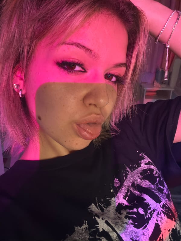 Individual photographs selfies in colorful lighting in Bulgarian bedroom