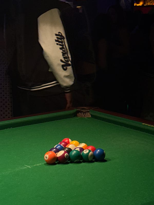 Evening social gathering at pool hall in Liangjiang
