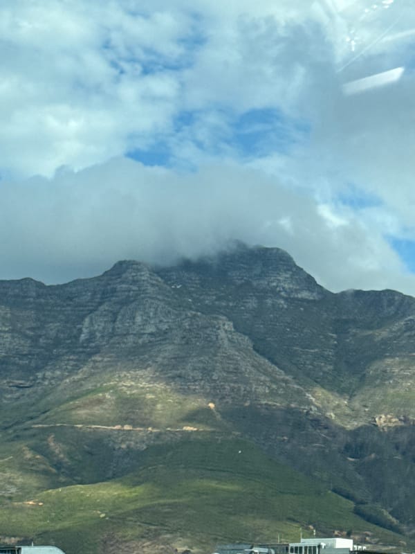 Table Mountain partially clouded over Cape Town afternoon