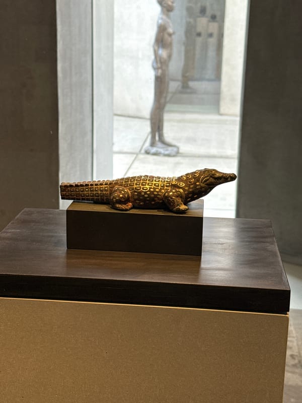 Visitor documents Egyptian artifacts at Munich museum Friday morning