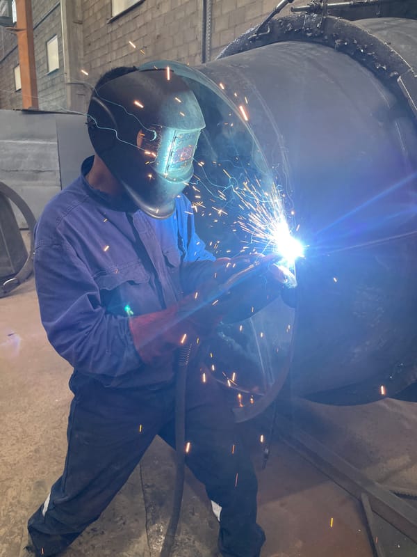 Metalworker fabricates cylindrical structure in Zaljevo workshop