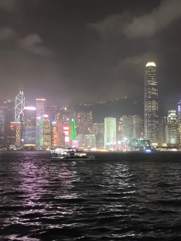 Evening activity around Victoria Harbour draws crowds and sightseers