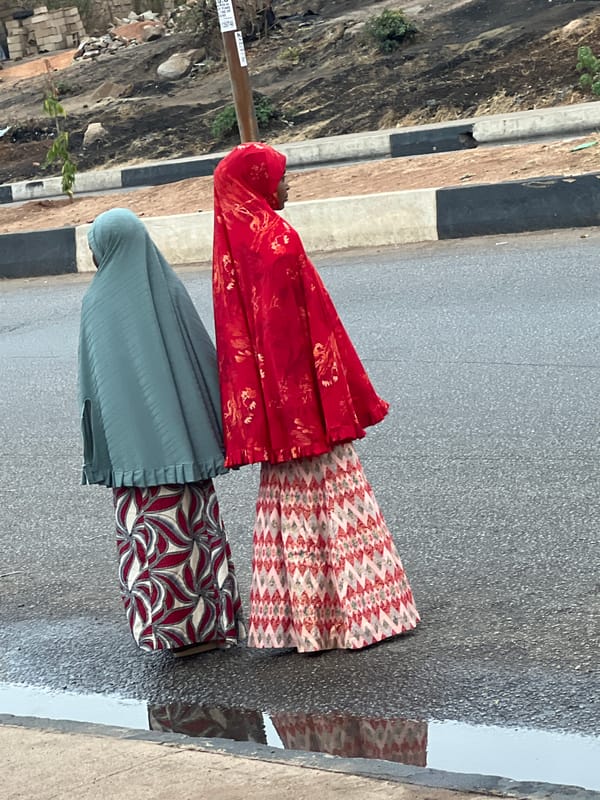 Daily life scenes documented across Jos, Nigeria during wet weather