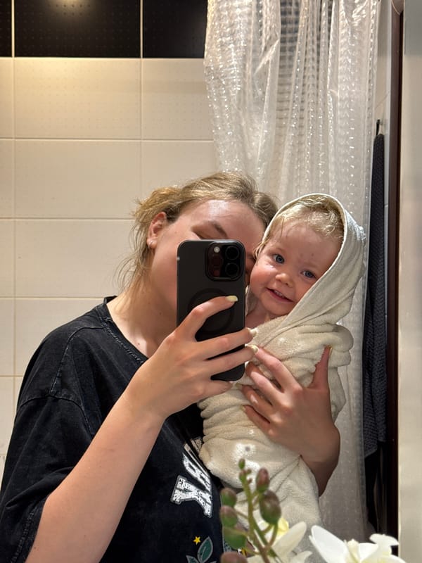 Parent documents toddler's bath time routine in Vladimir