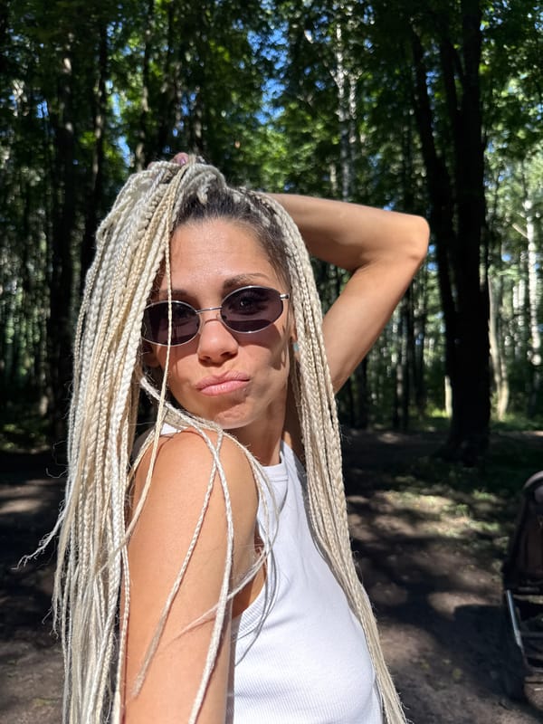 Sunny morning selfies in a Russian forest with a child nearby
