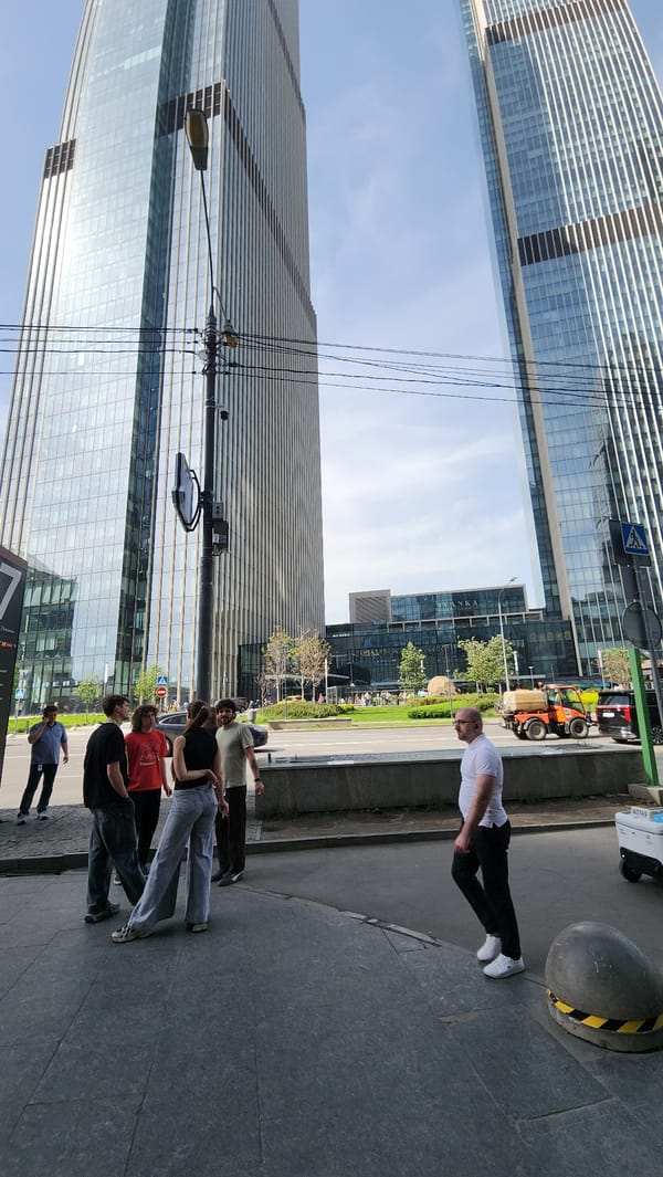 Pedestrian walks against crowd flow on Moscow sidewalk