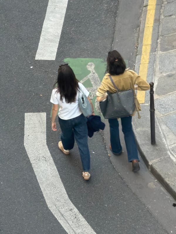 Evening street activity near Saint-Roch church in Paris