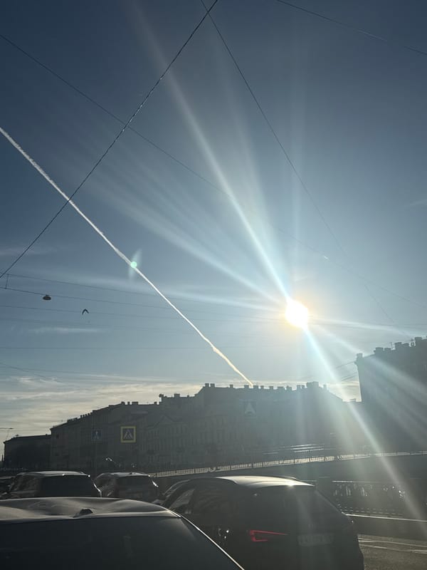 Afternoon scenes documented across Saint Petersburg streets and canals